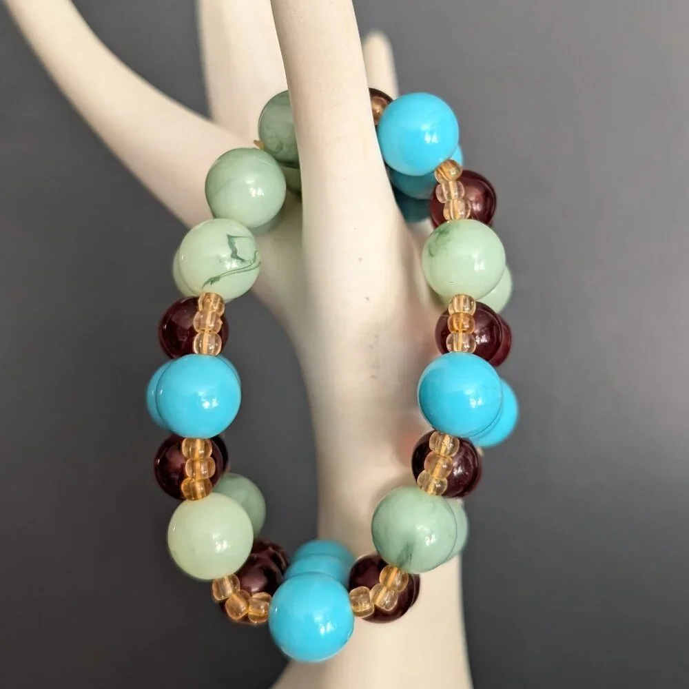 Blue, amber, green and pale yellow beaded stretch bracelet